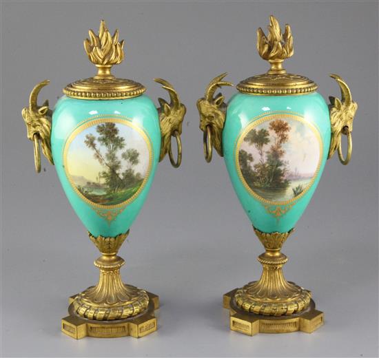 A pair of 19th century French ormolu mounted Sevres style jewelled porcelain cassoulets, height 9in.